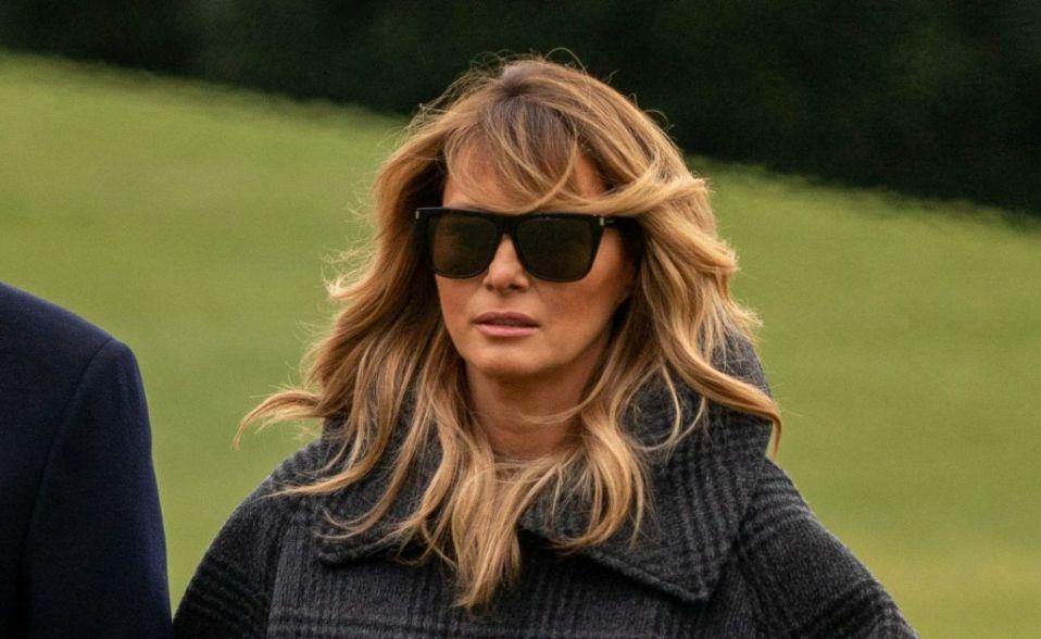 Melania Trump Styles Oversized Checkered Coat with Black Knee Boots to Return to the White House After Mar-a-Lago - Us Against Media